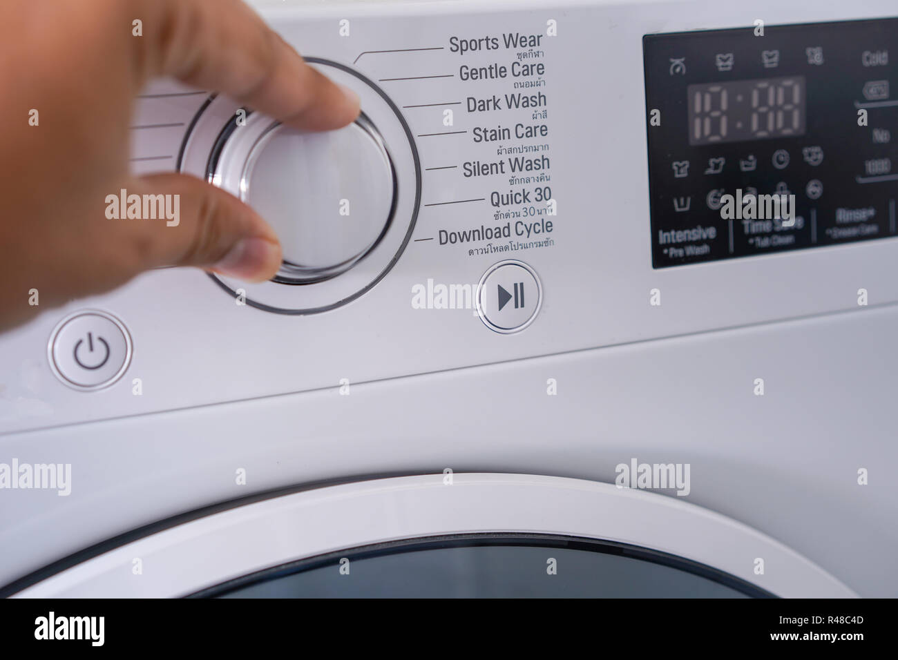 Start button on washing machine hires stock photography and images Alamy