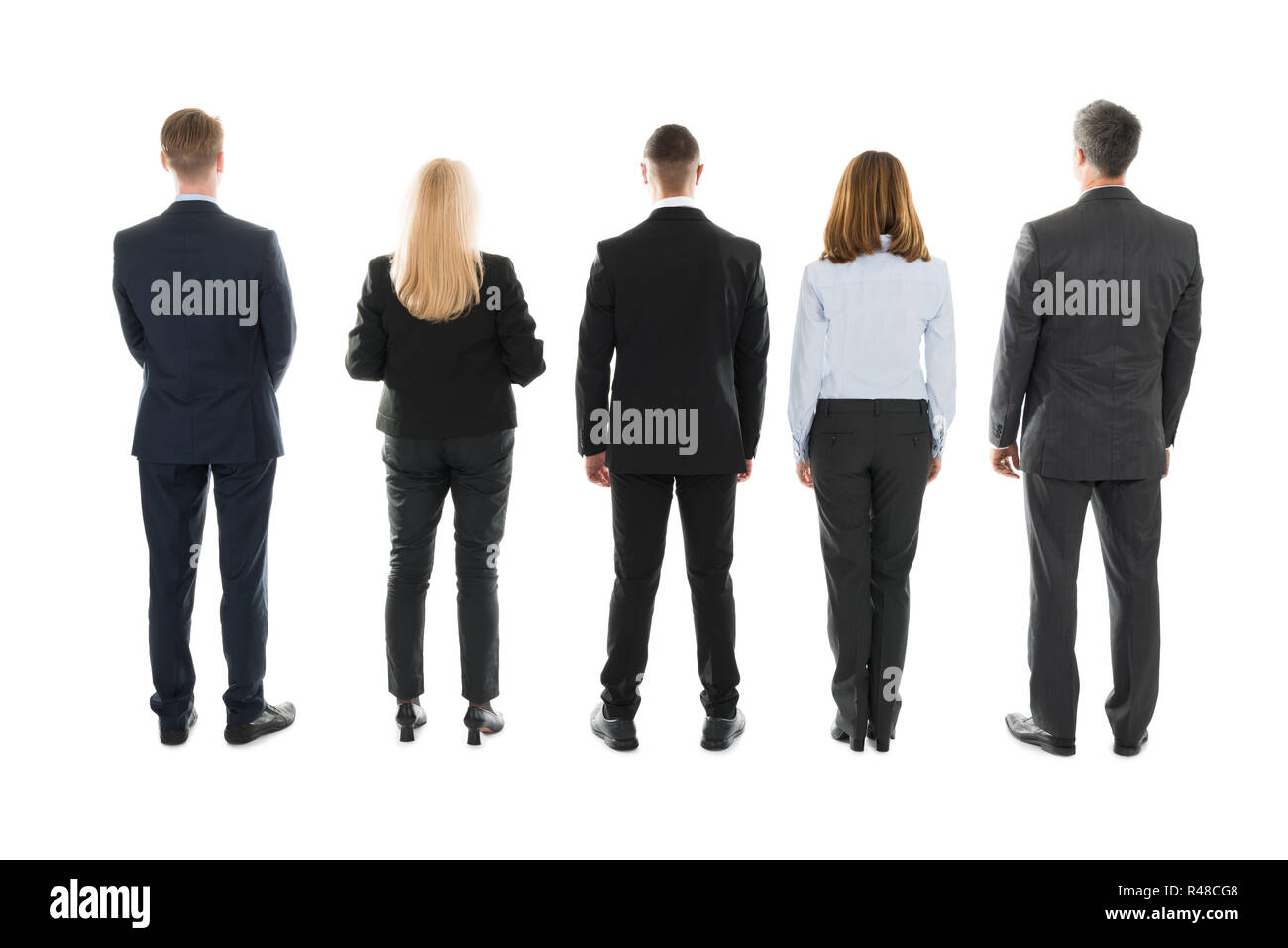 Business People Standing Against White Background Stock Photo
