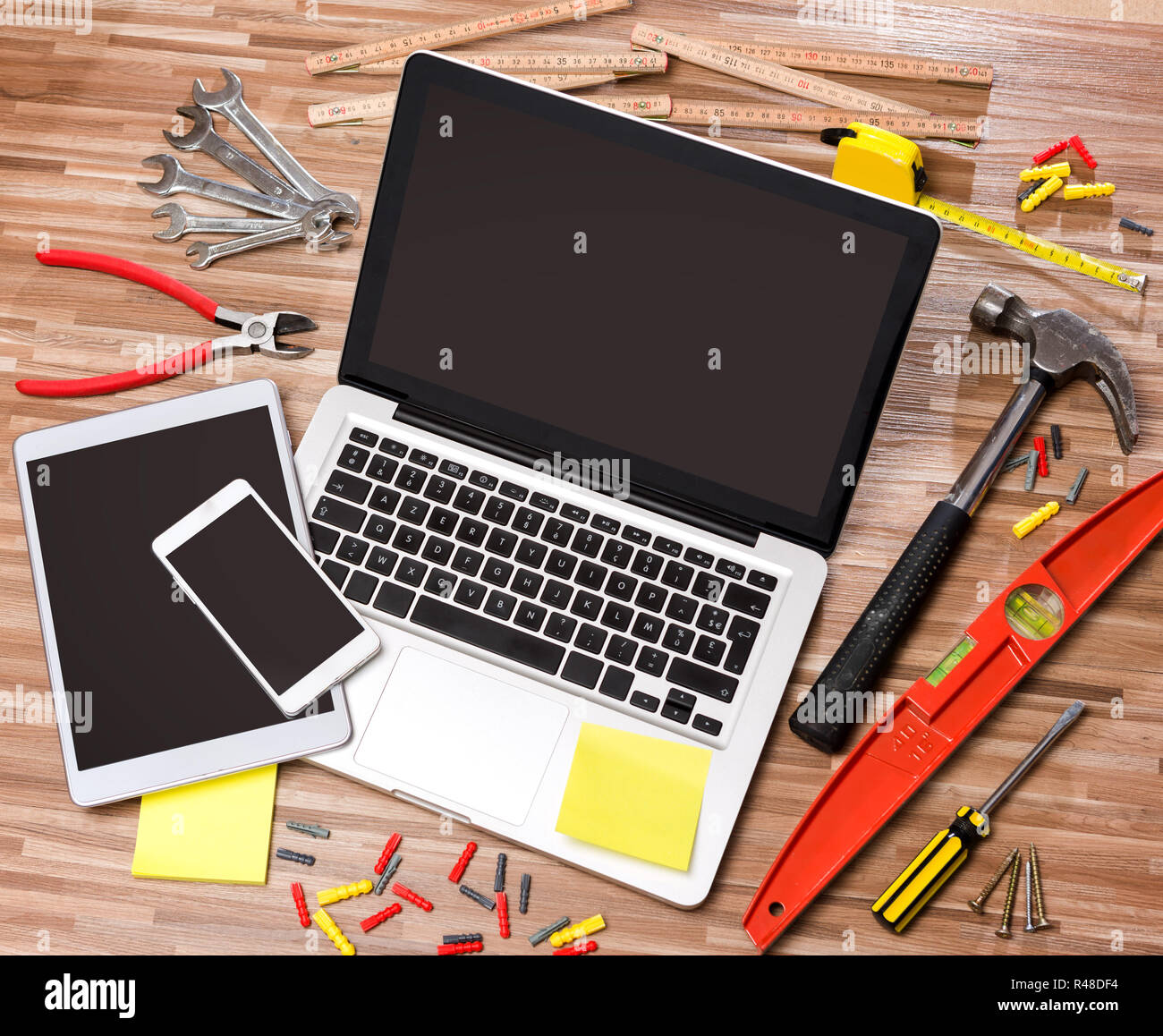 Wood handyman's desk in high definition with laptop, tablet and mobile ...