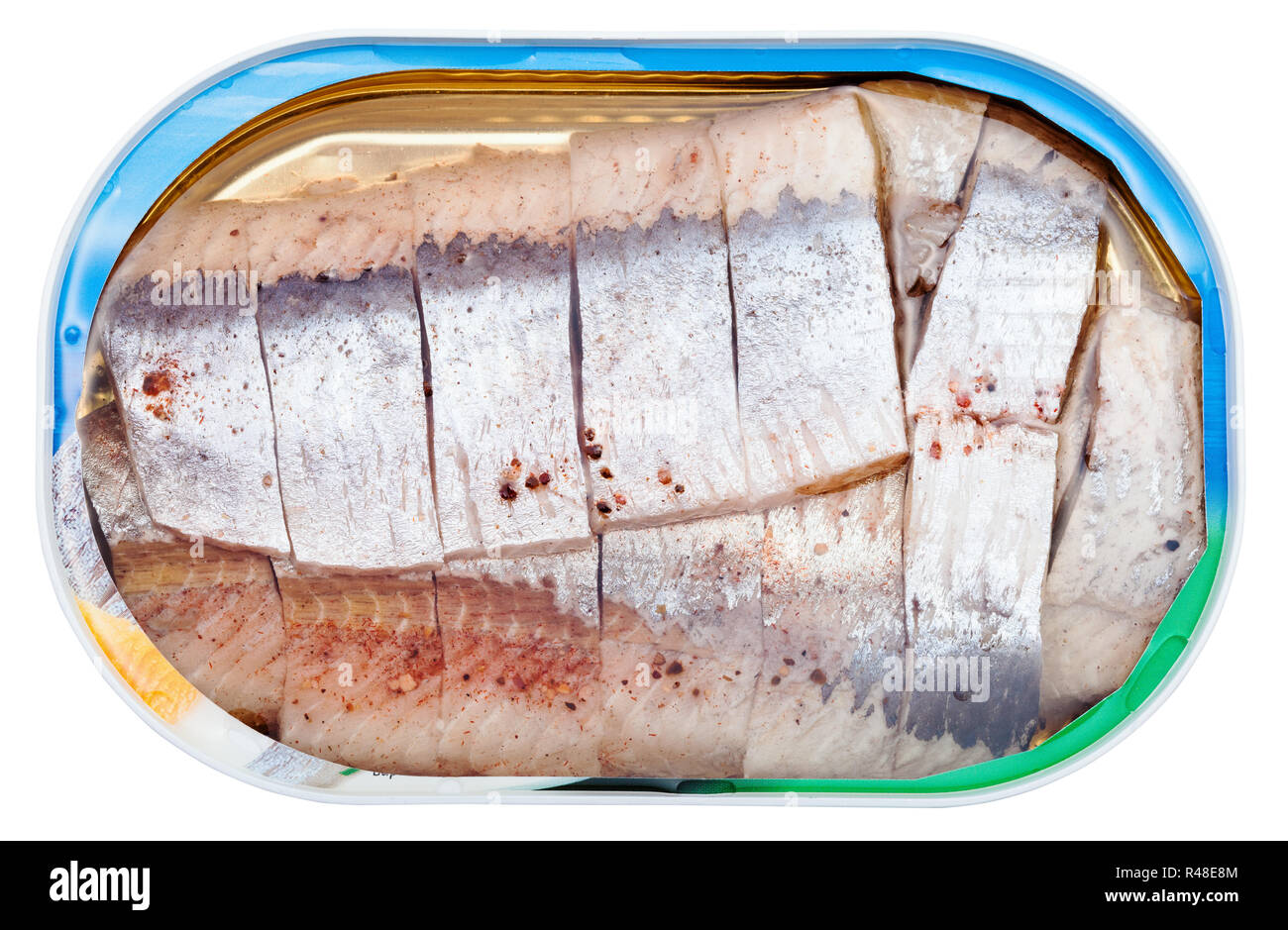 canned marinated herring in brine isolated Stock Photo Alamy