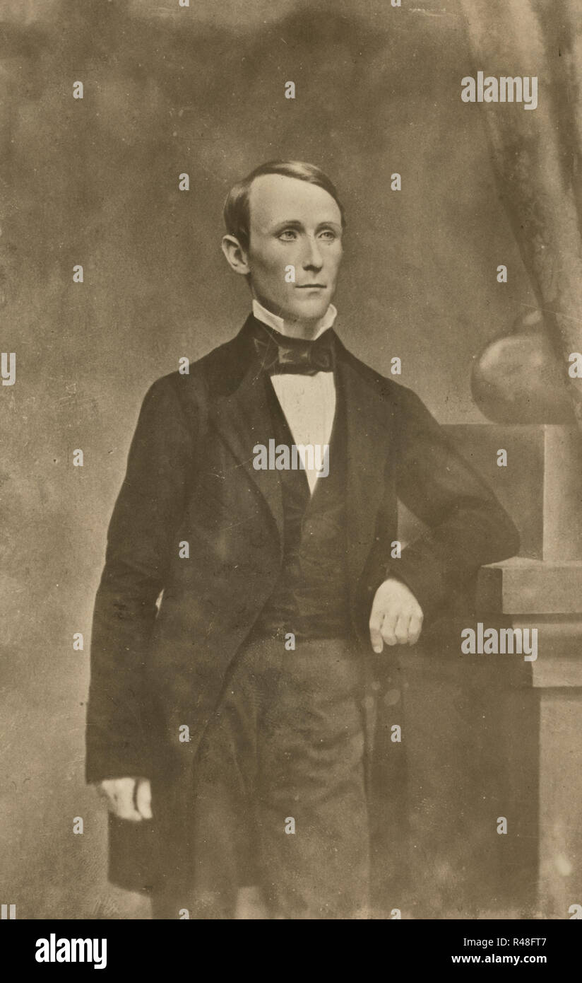 William Walker, three-quarter length studio portrait, standing, left arm resting on pedestal, facing slightly right, circa 1855 Stock Photo