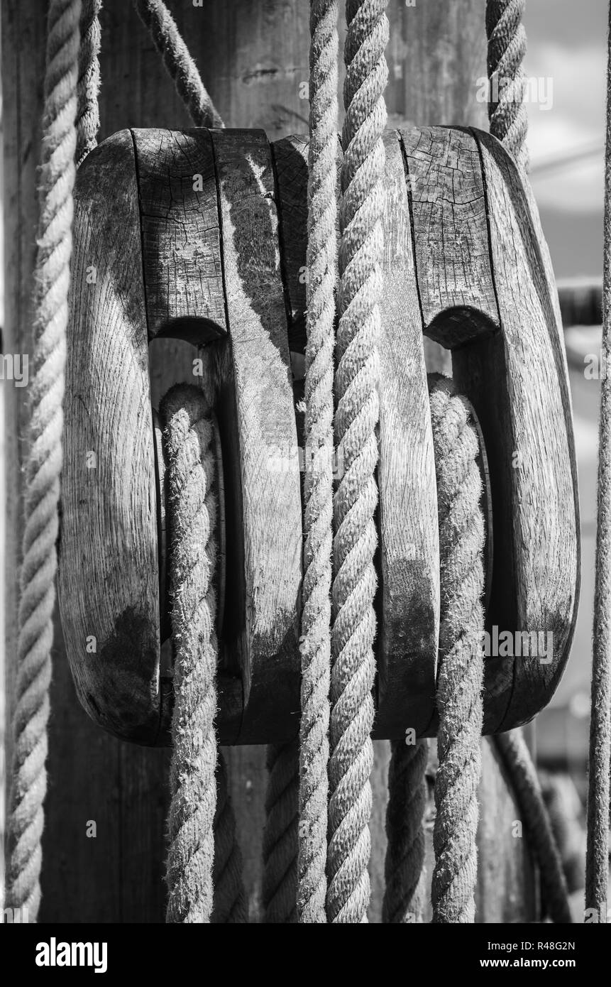 Blocks and rigging at the old sailboat, close-up Stock Photo