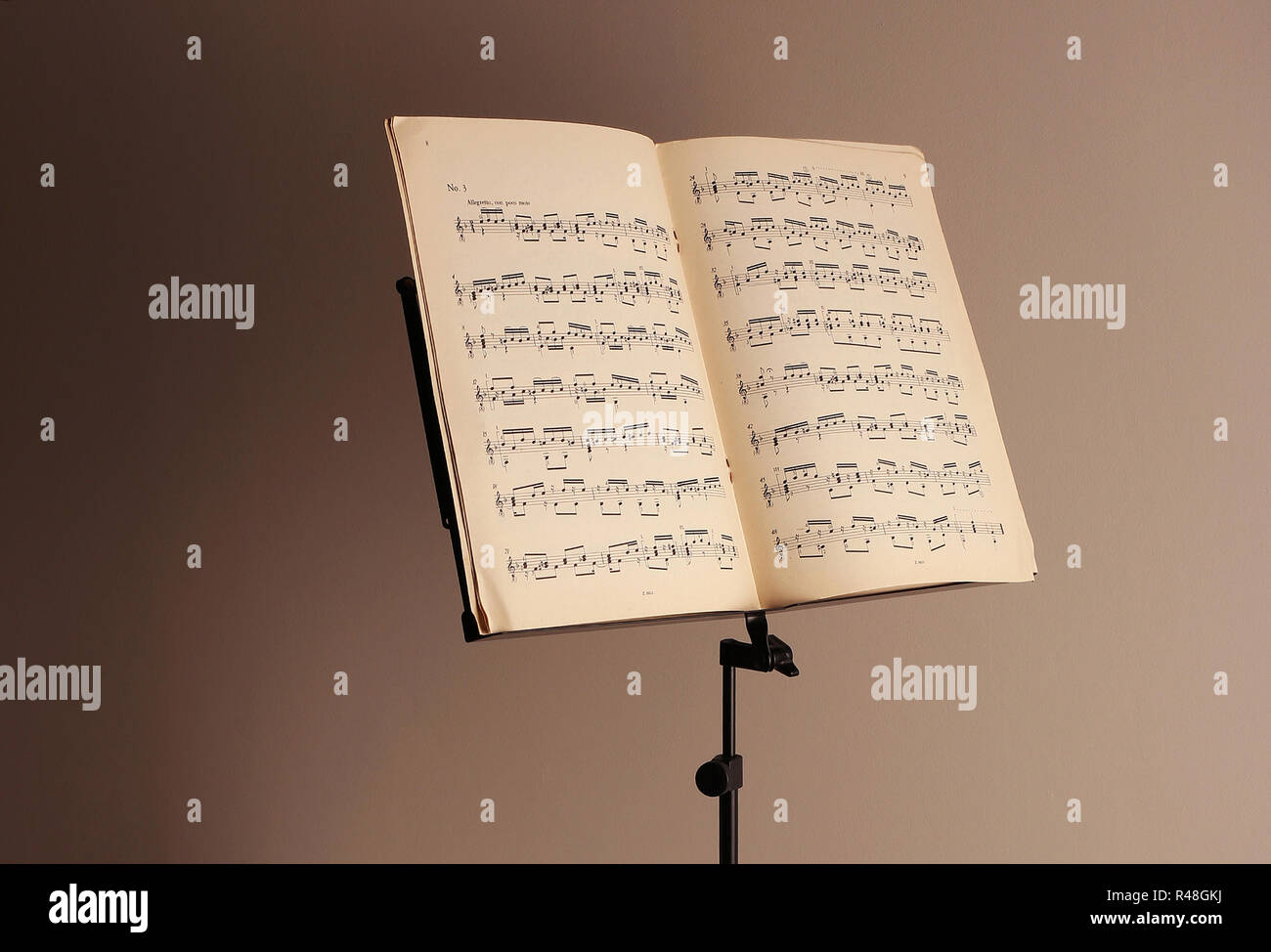 Music stand on brown background Stock Photo