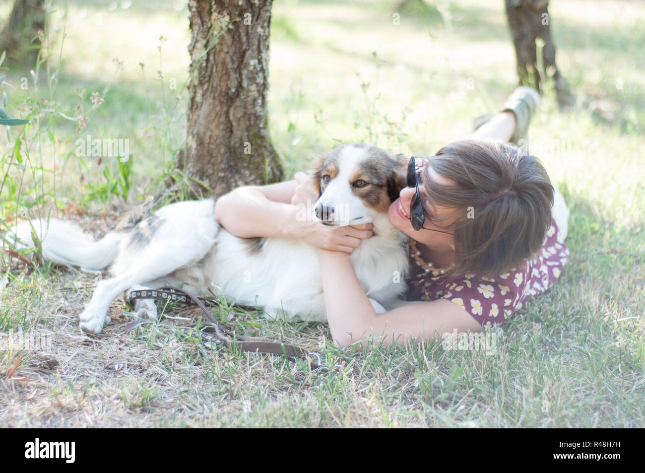 girl and pet dog Stock Photo