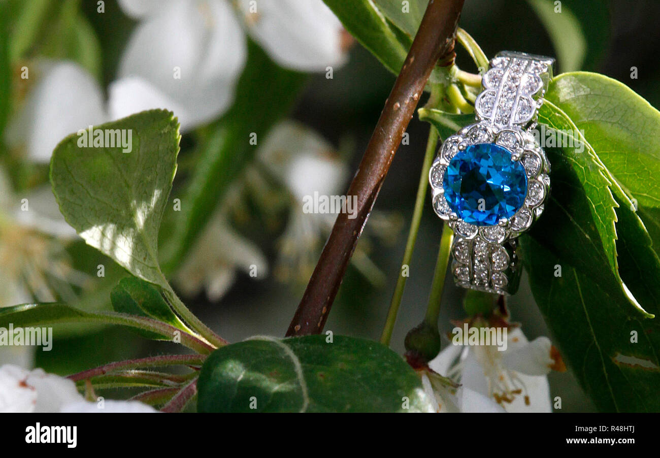 Blue topaz diamond engagement wedding ring Stock Photo
