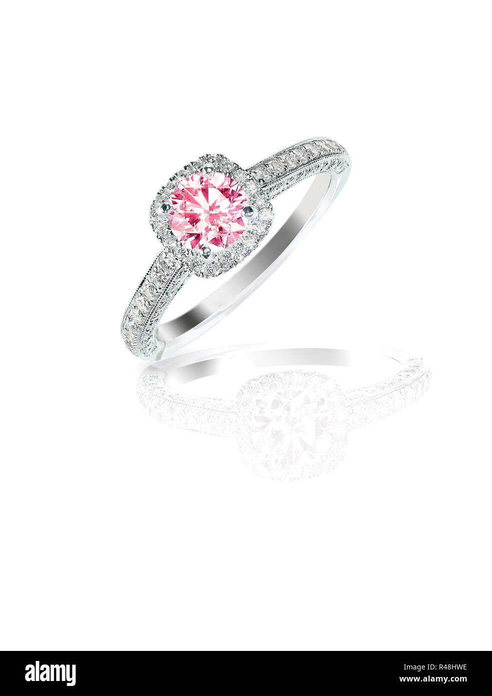 Pink round brilliant diamond halo engagement wedding ring Stock Photo