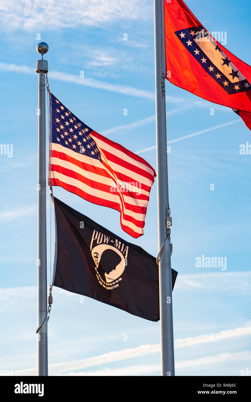 U.S. flag, Arkansas state flag, and POW-MIA flag at the Arkansas Welcome Center in West Memphis, Arkansas. (USA) Stock Photo