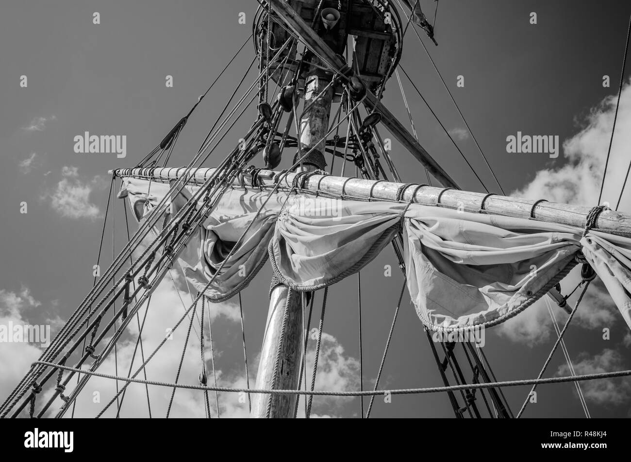 Mast with sails of an old sailing vessel, black and white photo Stock Photo