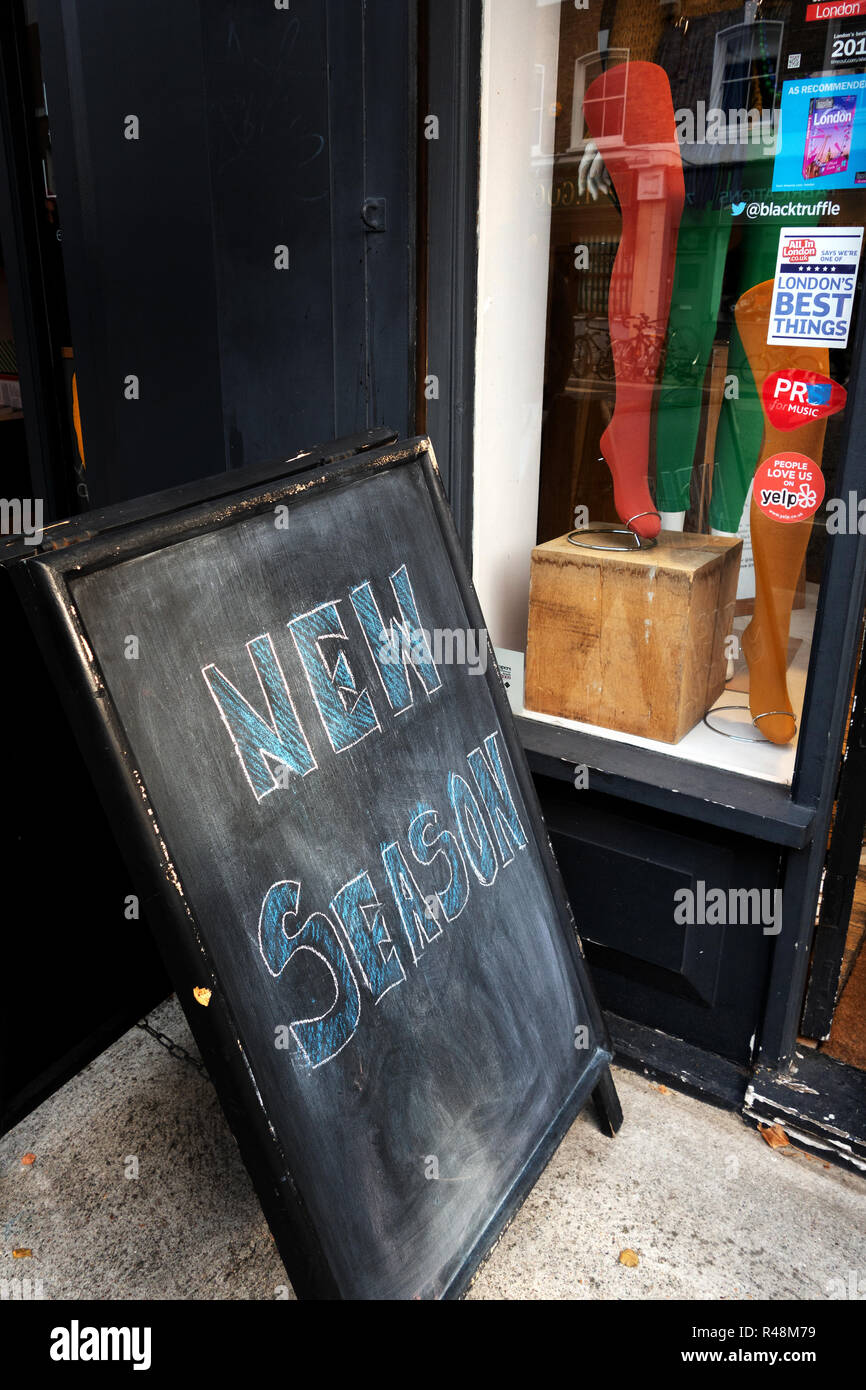 New Season Fashion sign written on a blackboard outside a fashion shop in Broadway Market, hackney, london Stock Photo