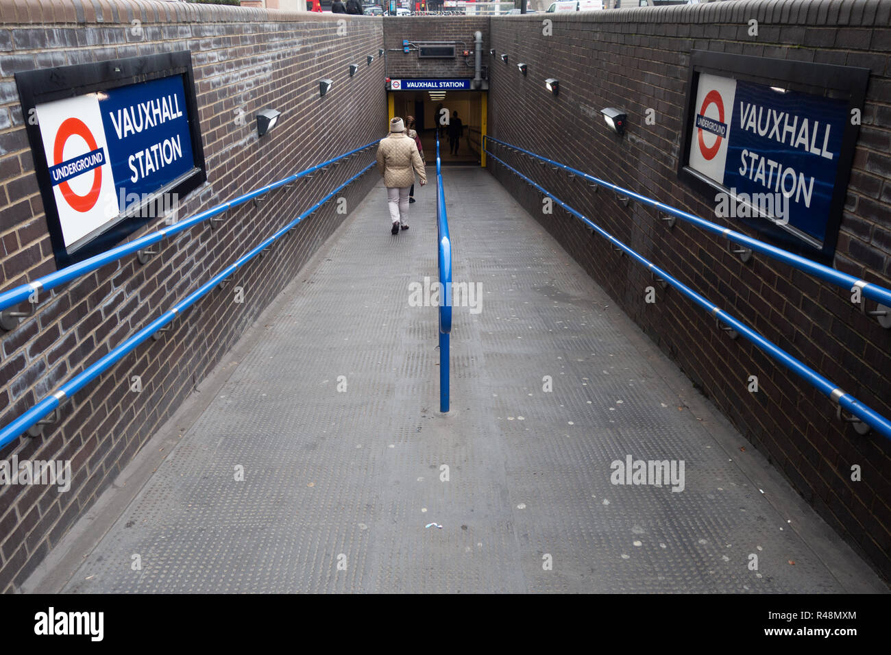 Tube commuters time, Underground entrance ramp to Vauxhall Tube Station Stock Photo