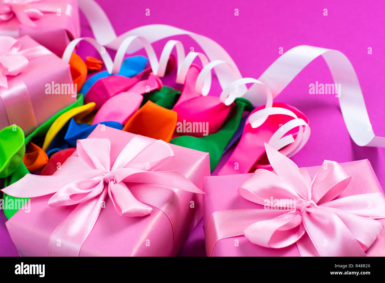 Decorative box composition with gifts satin ribbon bow inflatable balls ...