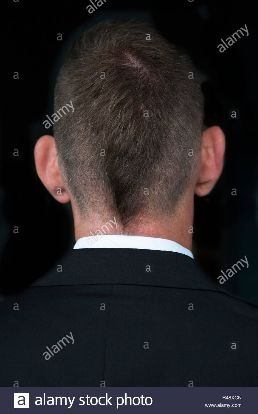 Backside Of Businessman With Hipster Haircut Stock Photo