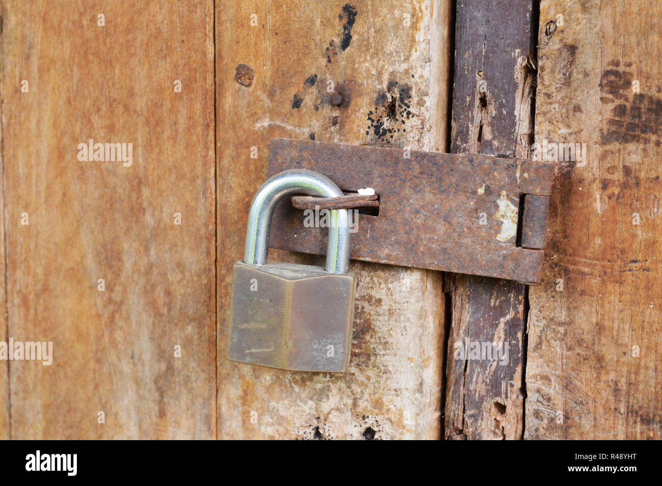 Vintage Old Lock On The Door Wooden Door With Metal Padlock With