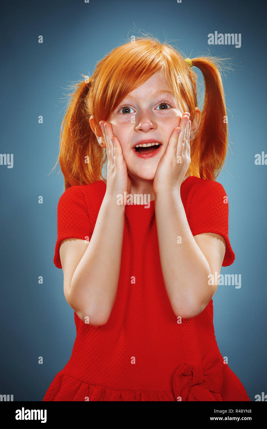 Beautiful portrait of a surprised little girl Stock Photo - Alamy
