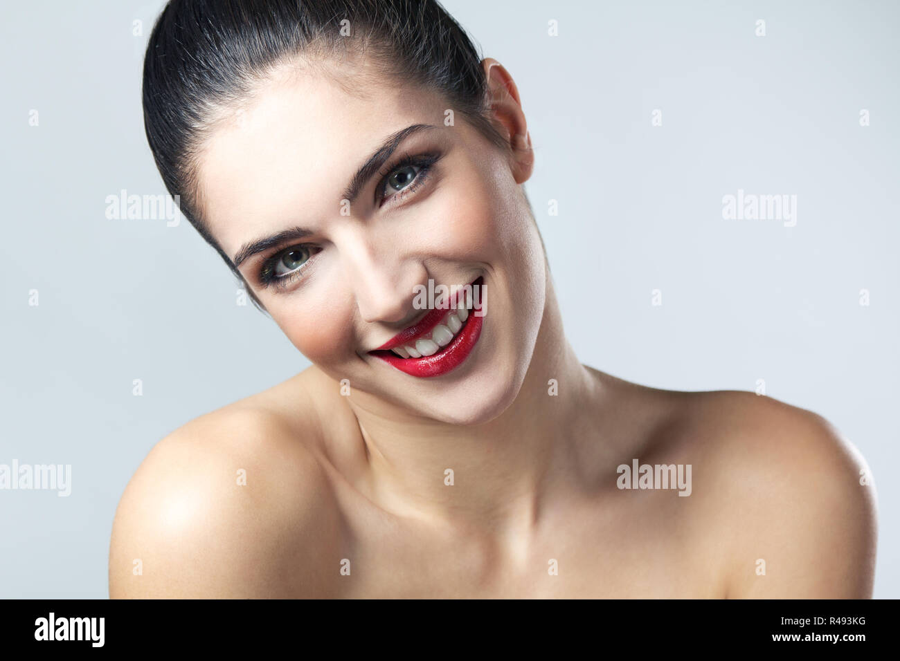 Beautiful face of young adult woman with clean fresh skin Stock Photo ...
