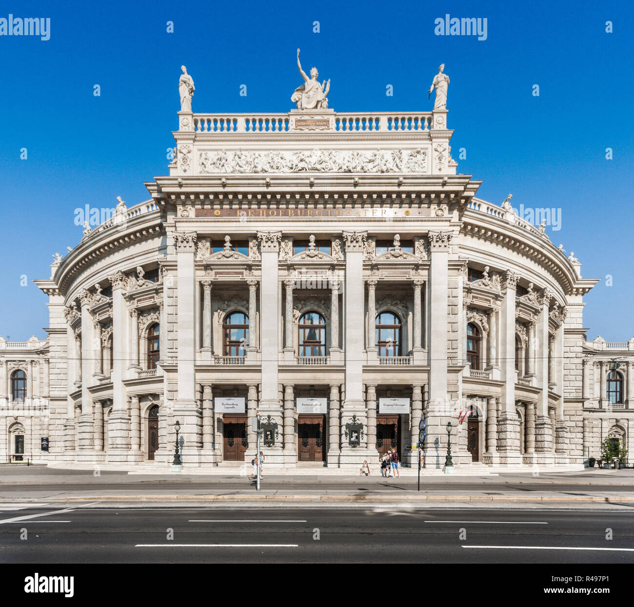 Beautiful view of historic Burgtheater (Imperial Court Theatre) with famous Wiener Ringstrasse in evening light, Vienna, Austria Stock Photo