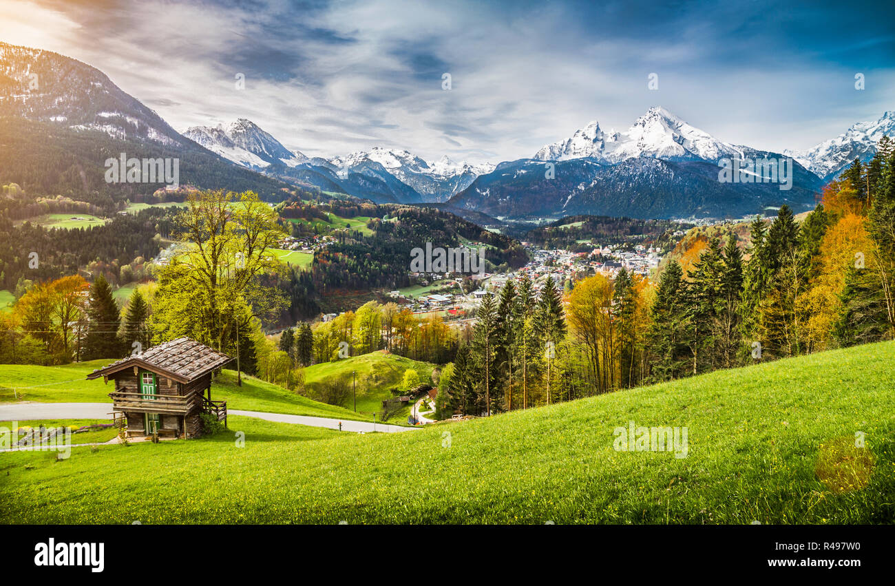 Panoramic view of beautiful mountain landscape in the Bavarian Alps with village of Berchtesgaden and Watzmann massif in the background at sunrise Stock Photo