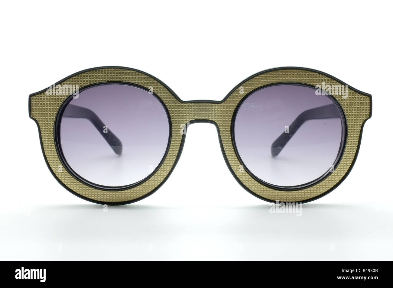 Yellow retro, vintage glasses, eye wear, black and golden frame Stock Photo