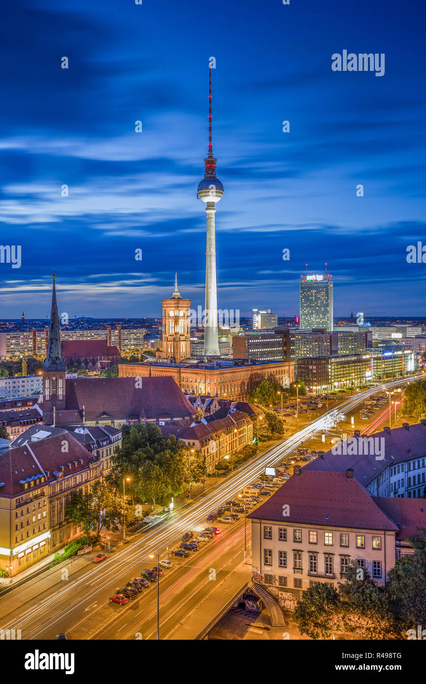 Aerial view of Berlin skyline with dramatic clouds in twilight during ...