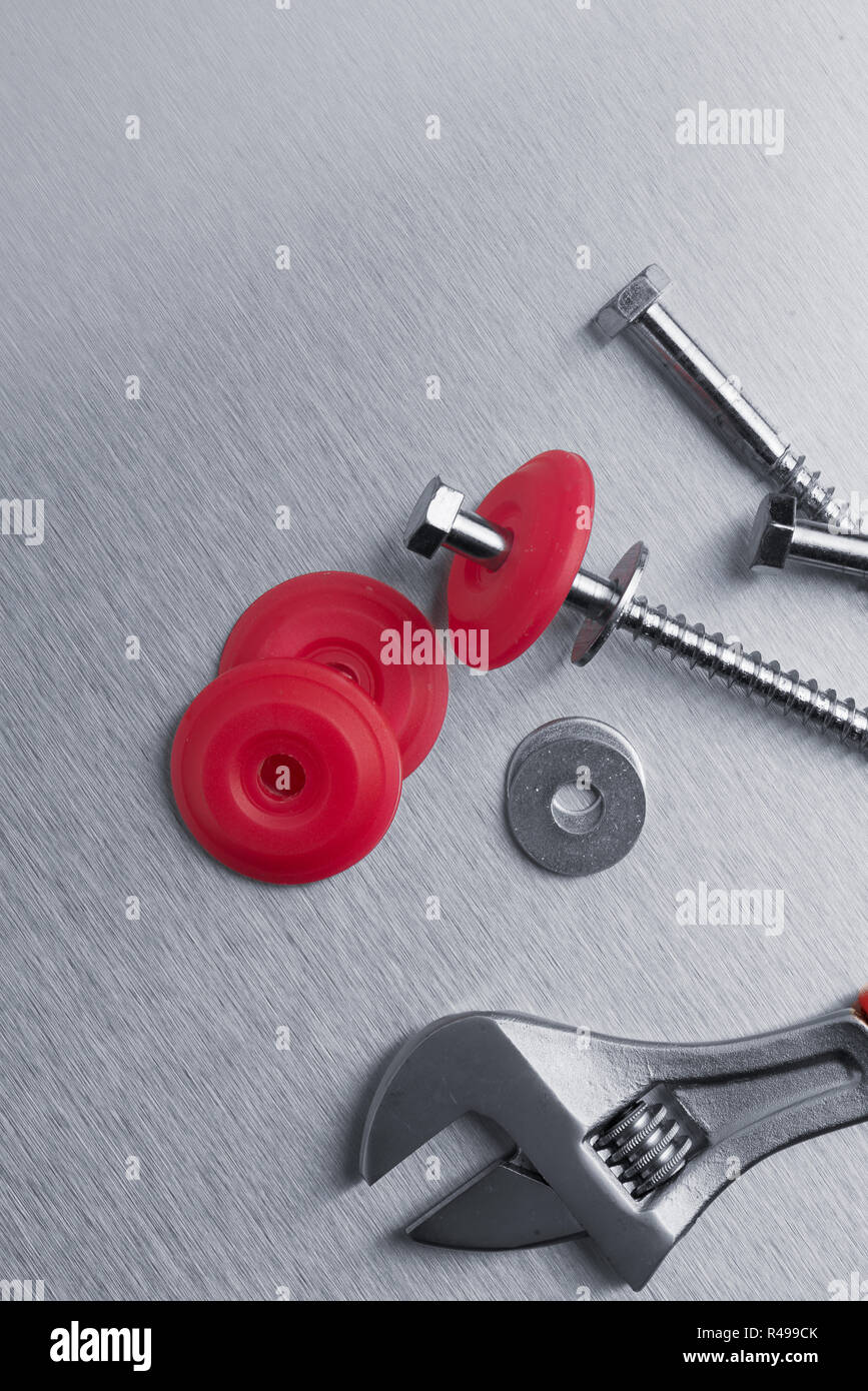 Spanner tool and screws Stock Photo