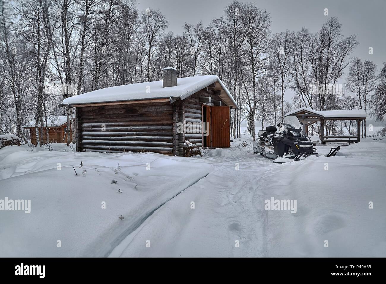Winter Snowy Landscape with Log Cabin Stock Photo - Alamy