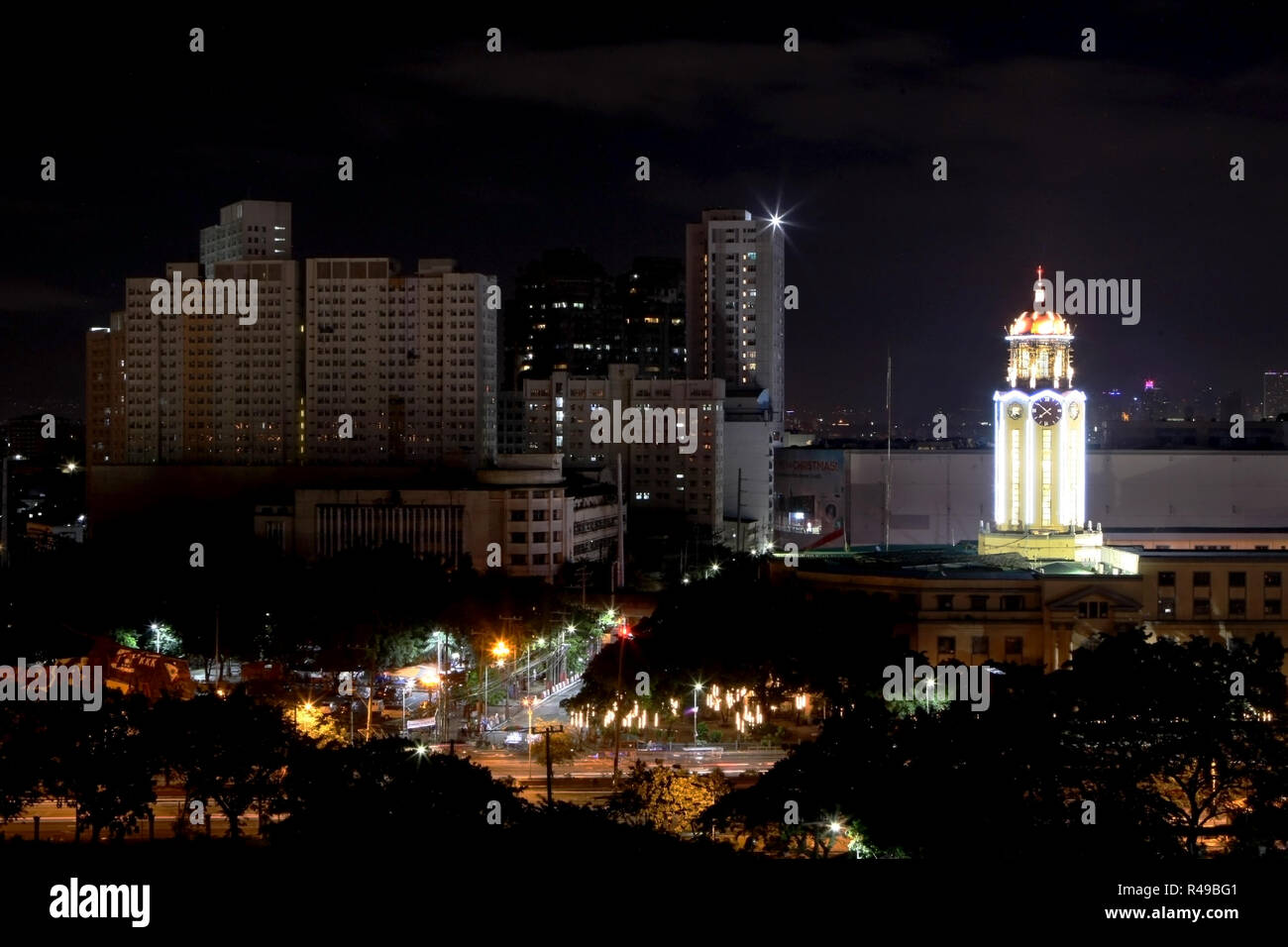 The Manila City Hall clock tower in the Philippines is seen illuminated