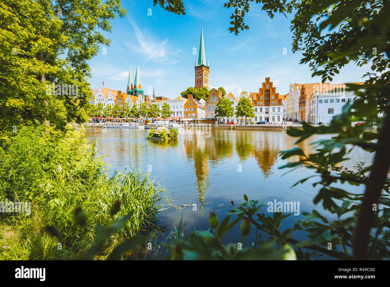 Classic panorama view of the historic city of Luebeck with famous Trave river in summer, Schleswig-Holstein, Germany Stock Photo