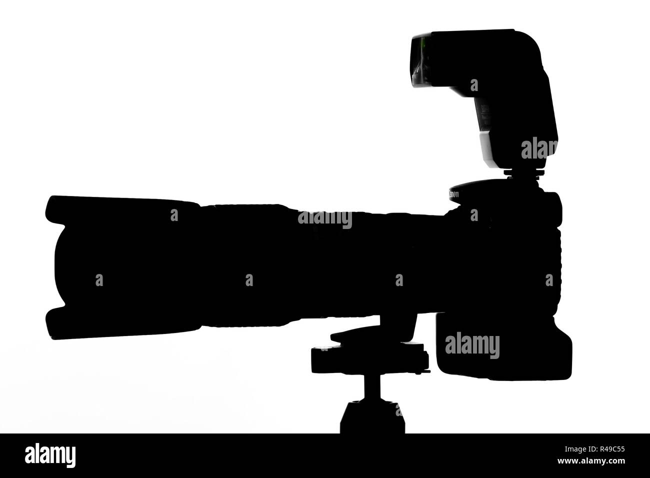 silhouette camera lens and flash Stock Photo - Alamy