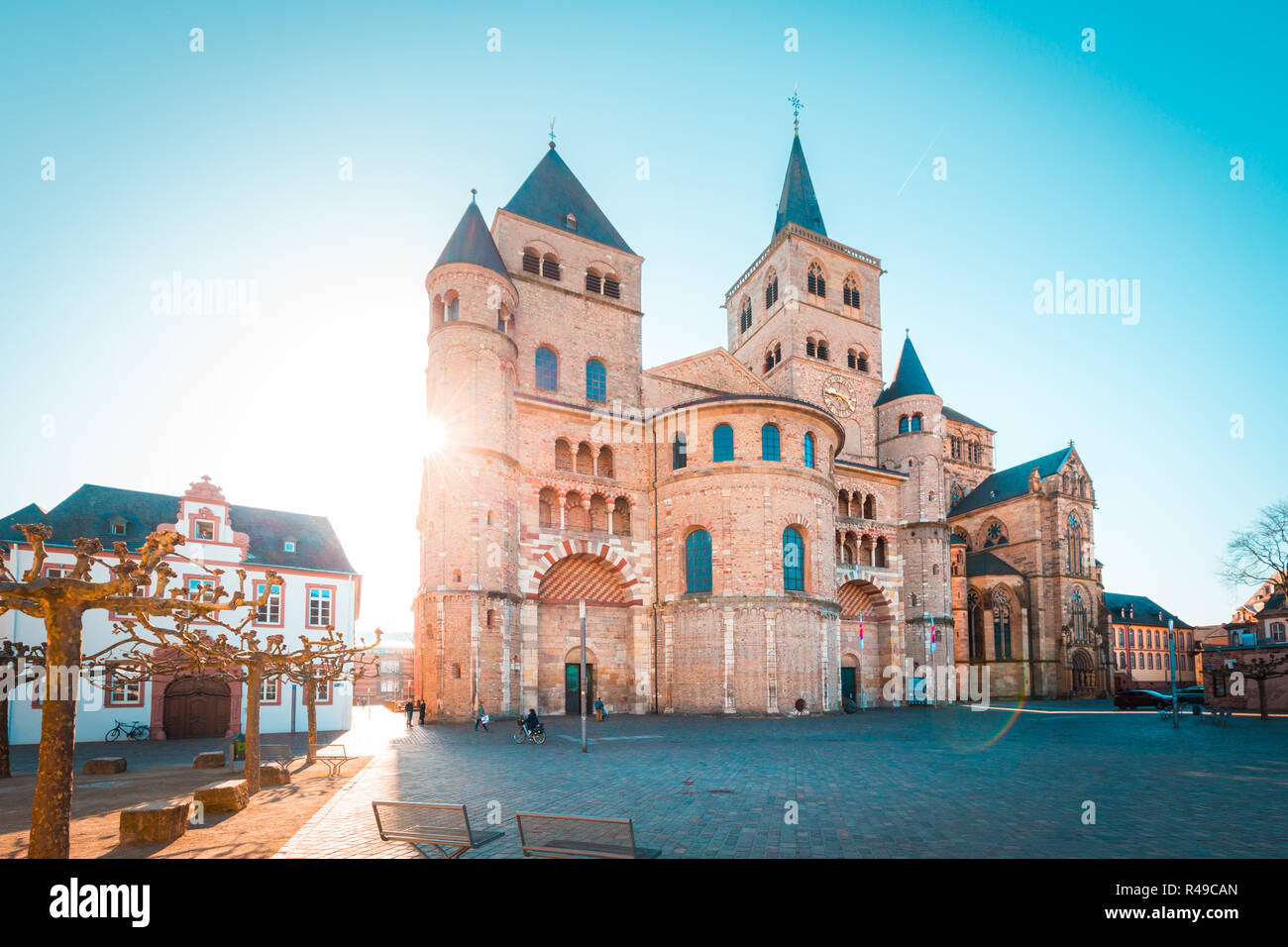 Beautiful view of famous Trierer Dom (High Cathedral of Trier) in beautiful golden morning light in summer, Trier, Germany Stock Photo