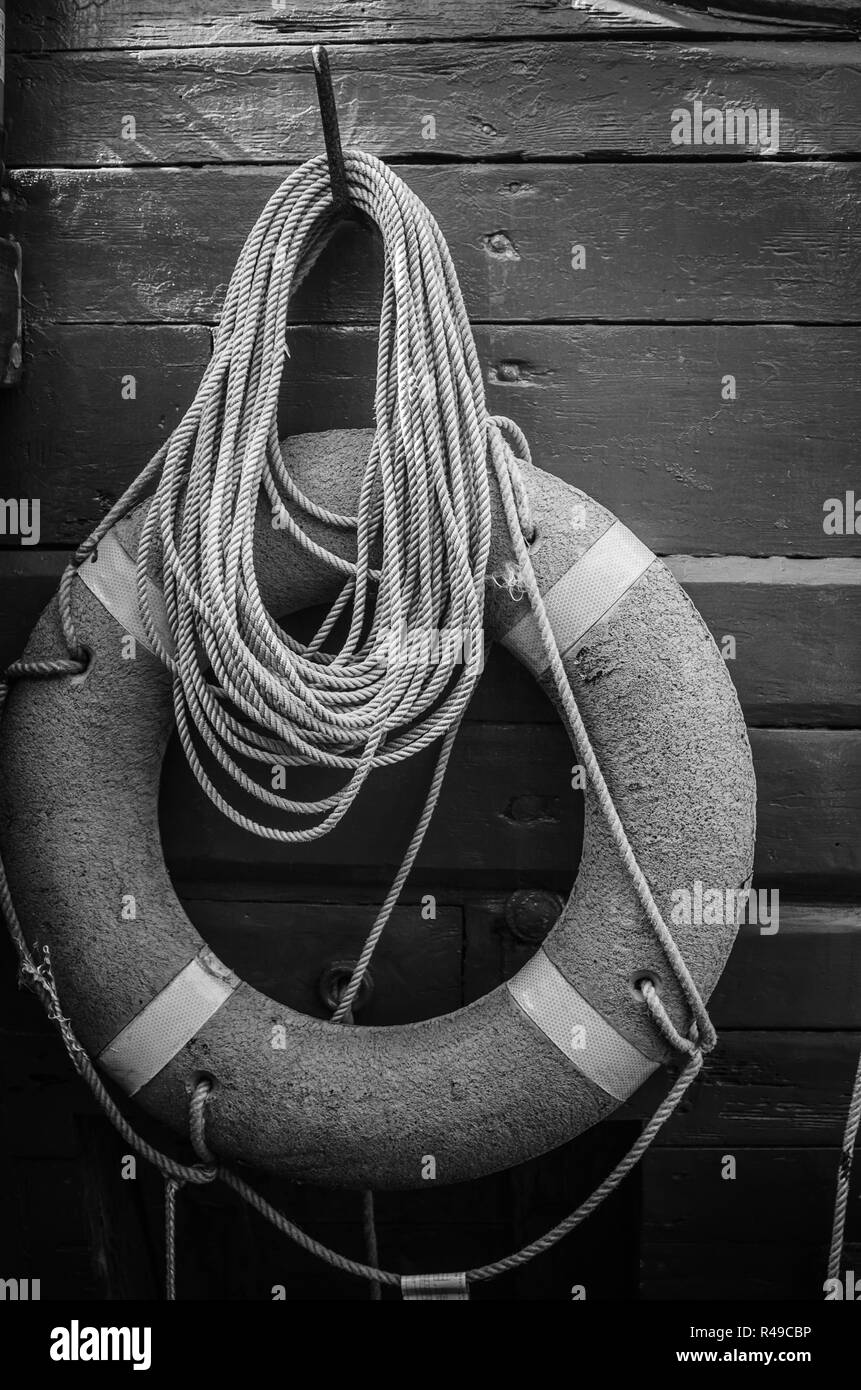 Red lifering on a yacht Stock Photo