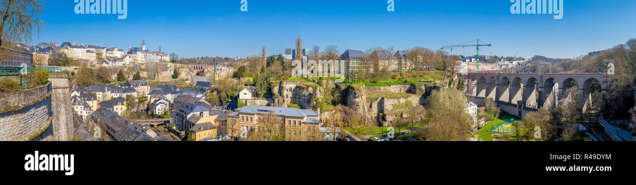 Panoramic view of the famous old town of with Alzette river on a beautiful sunny day with blue sky in springtime, Luxembourg Stock Photo