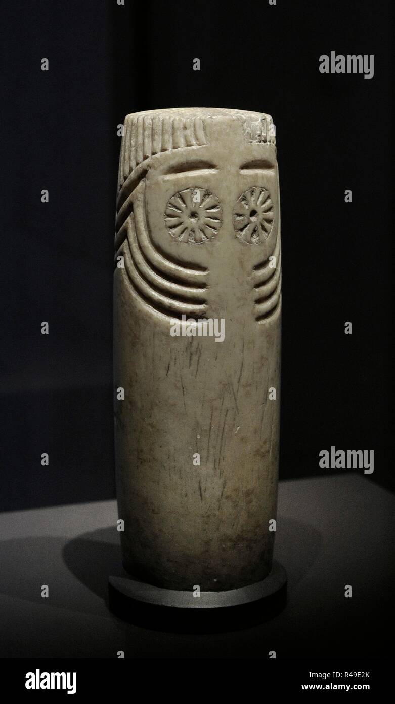 Idol of Extremadura. Anthropomorphic cylindrical sculpture. Chalcolithic. 2500 BC.  Alabaster. Found in the Guadalquivir Valley. Andalusia. National Archaeological Museum. Madrid. Spain. Stock Photo