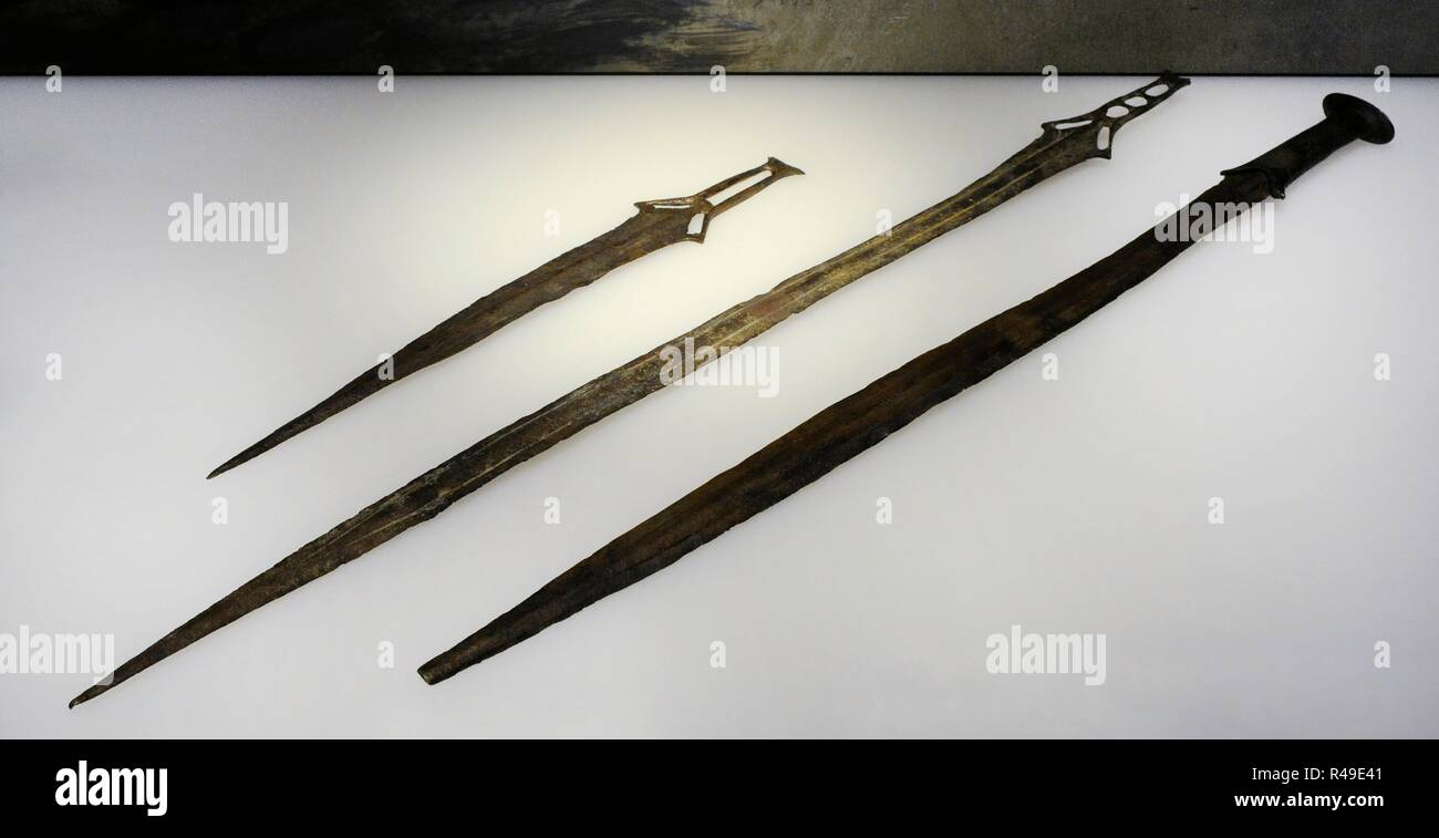 Bronze swords topped in carp tongue. Late Bronze Age. 1000-850 BC. Ria of Huelva, province of Huelva, Andalusia. National Archaeological Museum. Madrid. Spain. Stock Photo
