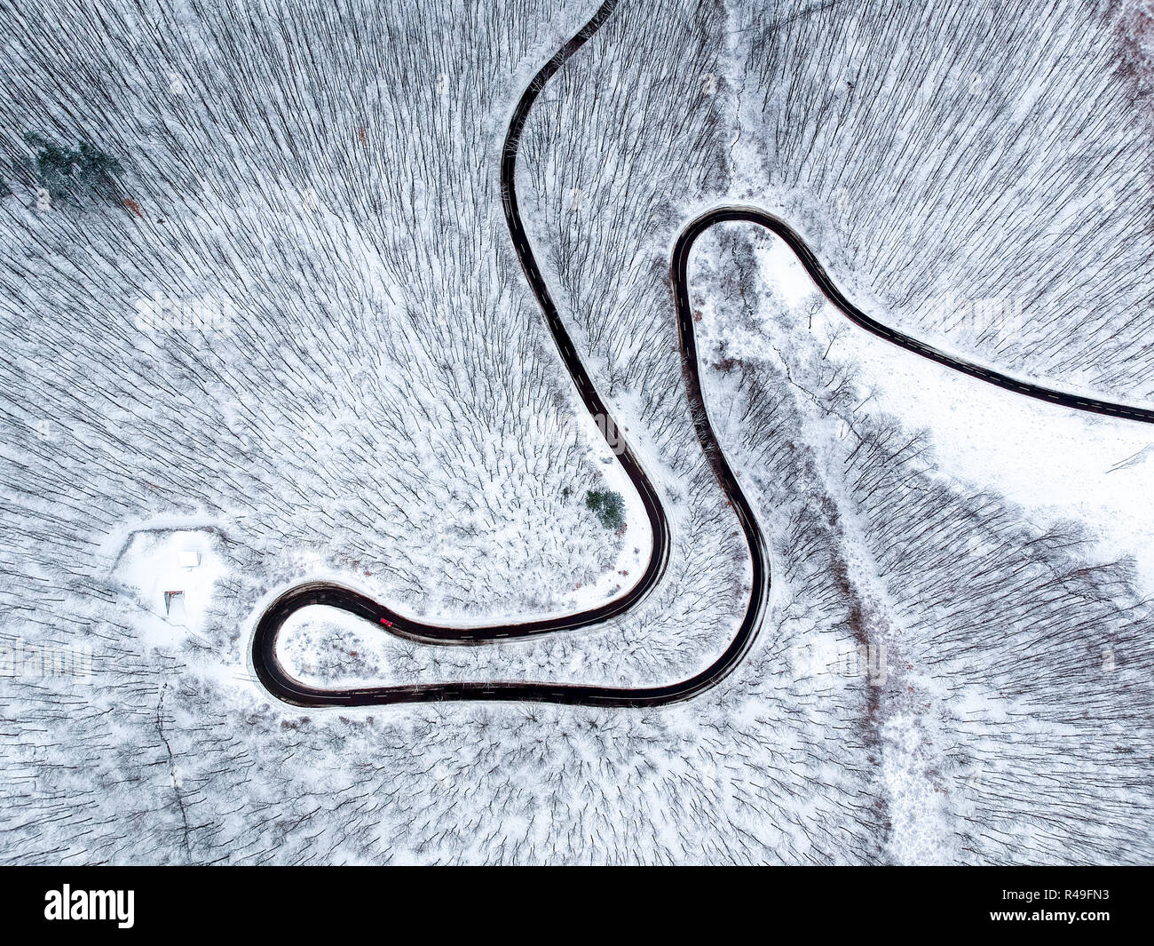 Aerial view of winding road in winter Stock Photo - Alamy