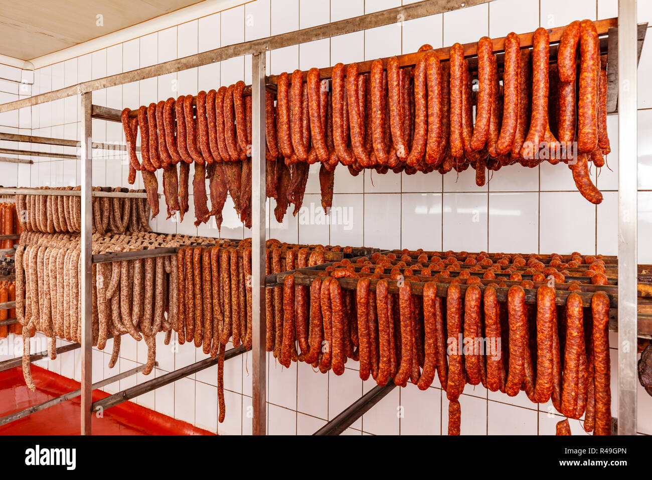 Download Stick Of Salami Are Smoked On The Background Of The Meat Factory Stock Photo Alamy PSD Mockup Templates