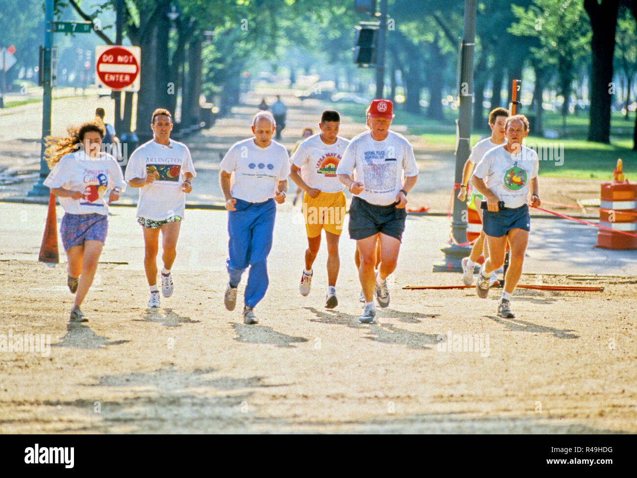 United States President Bill Clinton, third right, goes jogging with Chief Judge Stephen Breyer, of the US Court of Appeals for the First Circuit, third left, along the Mall in Washington, DC on May 16, 1994. The President nominated Judge Breyer to be Associate Justice of the Supreme Court to replace Justice Harry Blackmun, who is retiring. Judge Breyer's daughter is at the far left. Credit: Jeff Markowitz/Pool via CNP | usage worldwide Stock Photo
