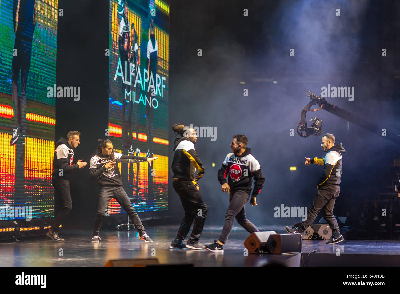 Bologna, Italy. 25th November, 2018. Breakdancers perform on catwalk in ...