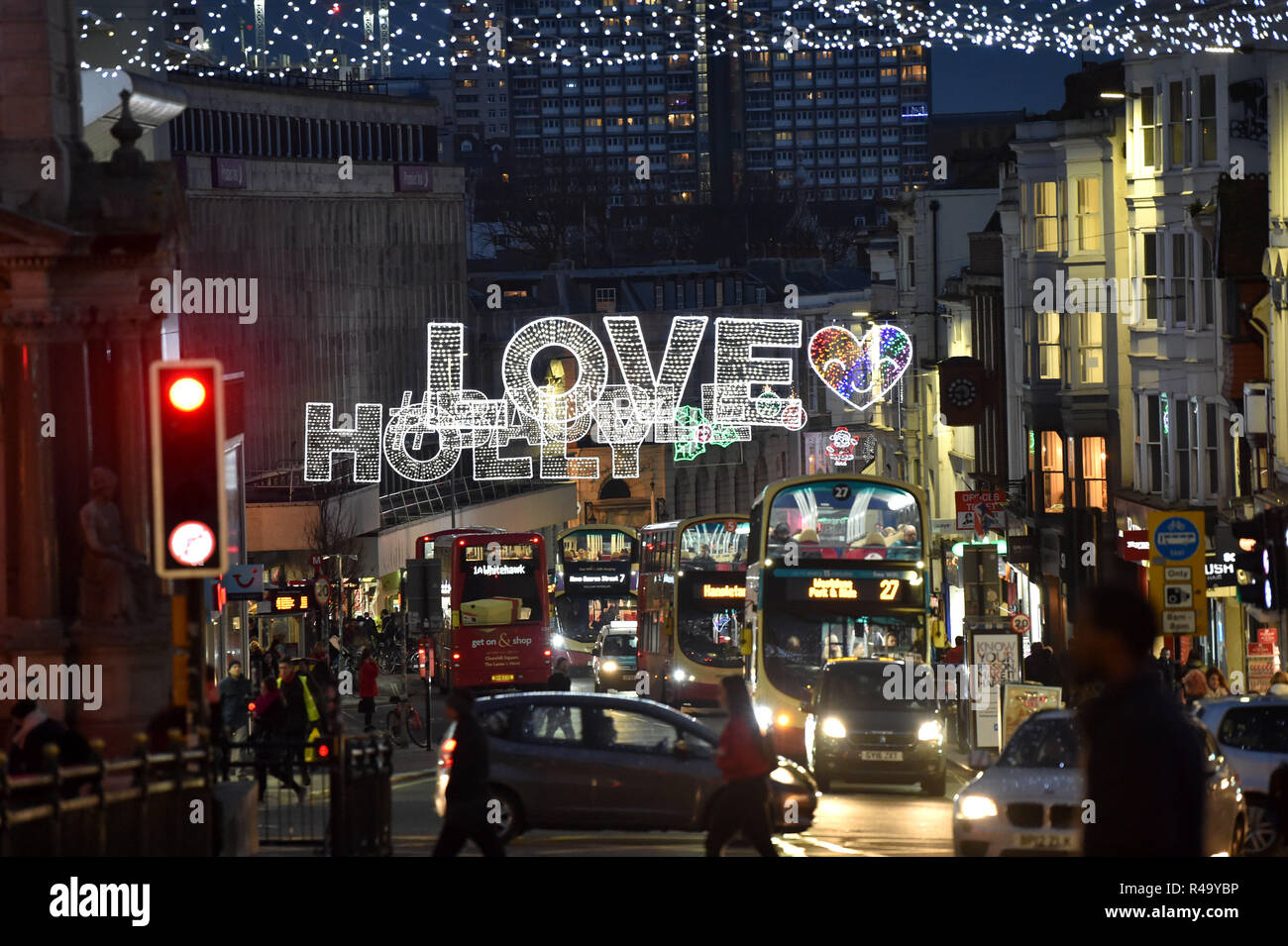 Brighton UK 26th November 2018 - Shoppers and traffic  out in force in  the North Street area of Brighton late this afternoon as Christmas shopping gets in full swing amongst the lights Credit: Simon Dack/Alamy Live News Stock Photo