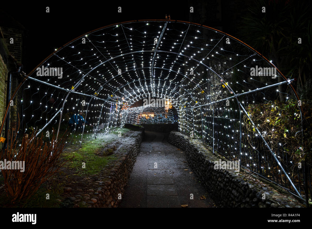 Christmas light display at the medieval town of Sandwich in Kent. Tunnel of white lights leading