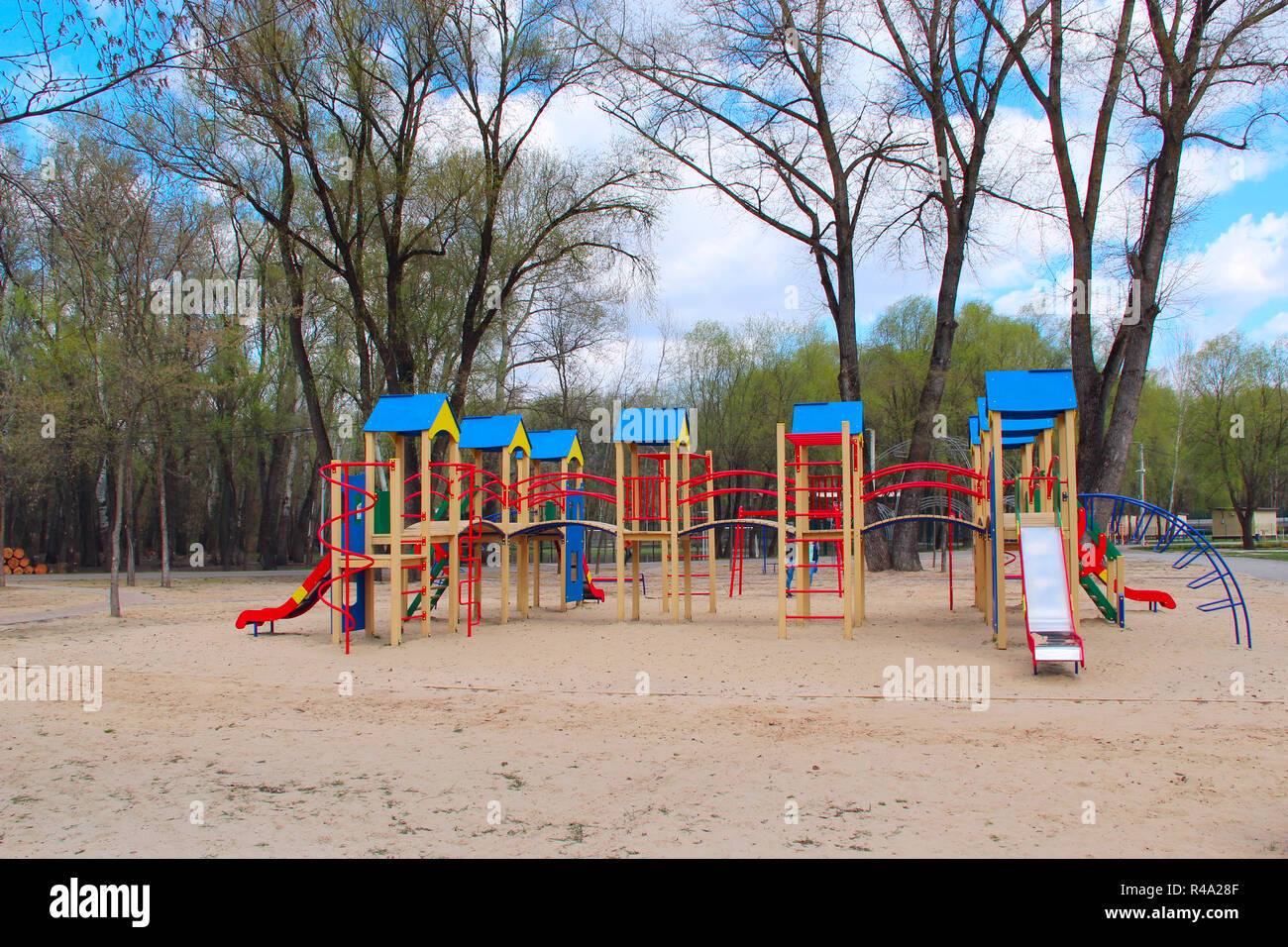 Childish Playground In City Park Swing Carousel In Park For