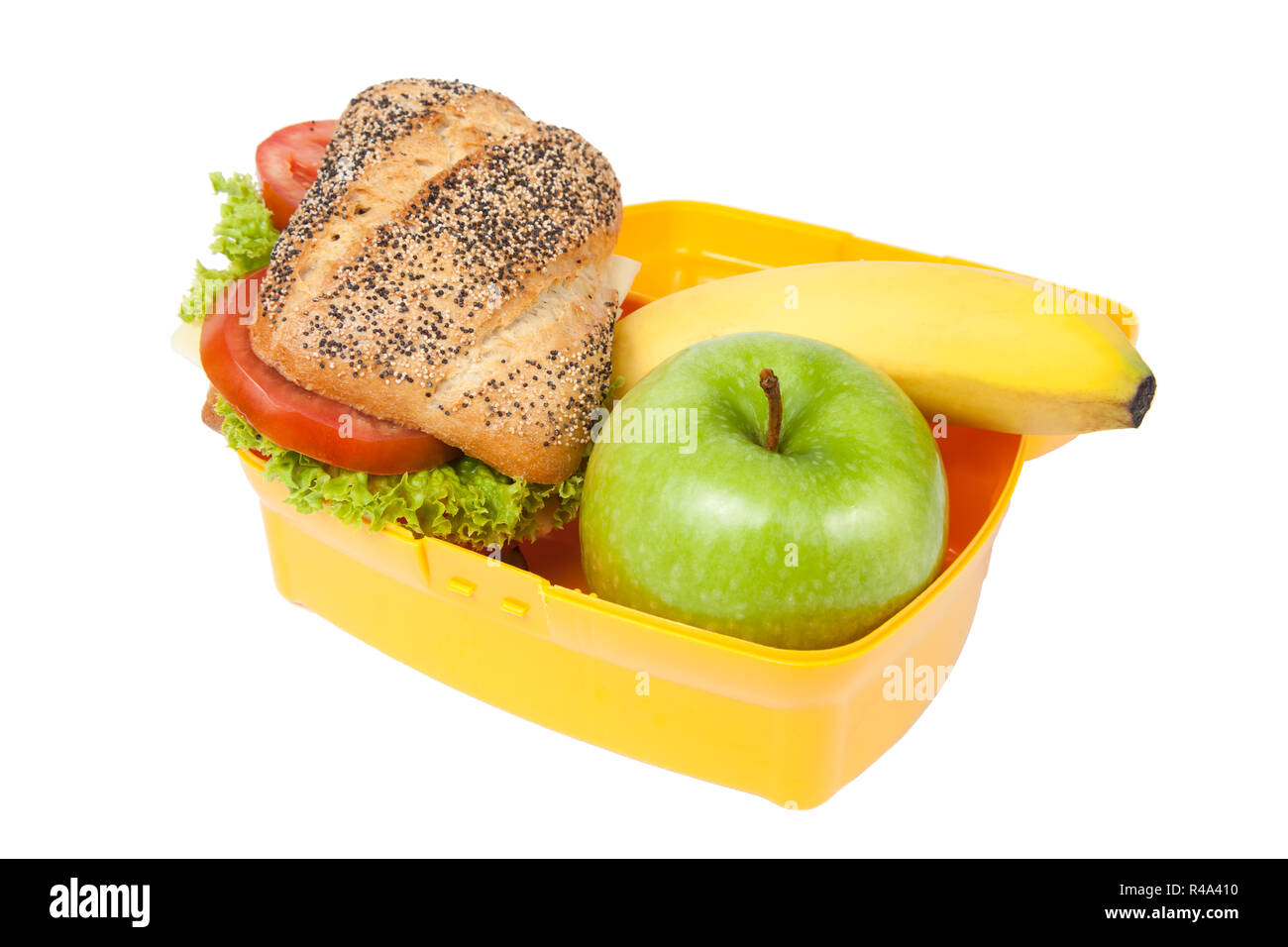 Premium Photo  Lunch box filled with sandwich near two thermos, fresh  apples and oranges, bananas in front of white modern kitchen table