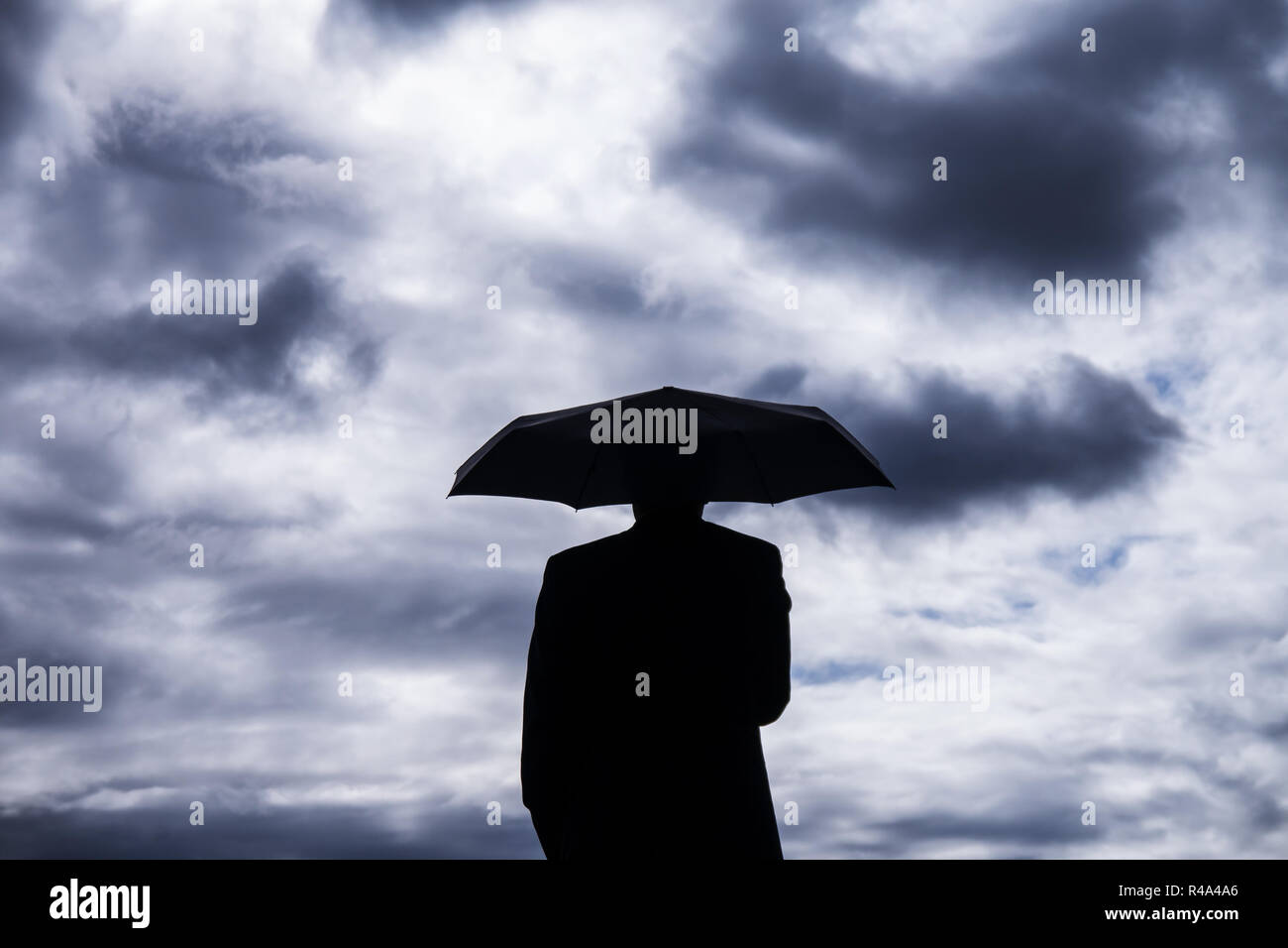 businessman and umbrella Stock Photo