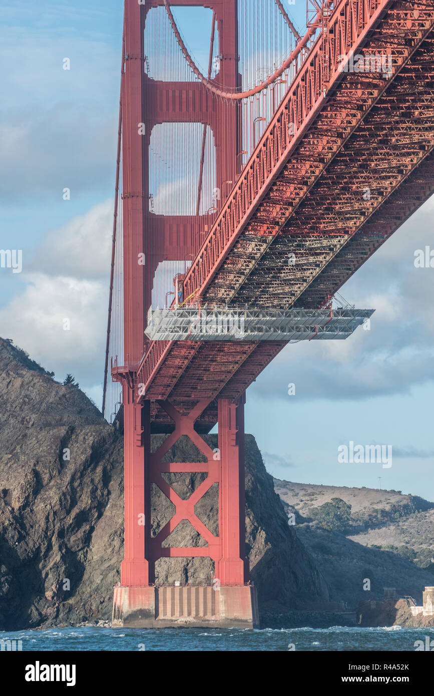 The famous golden gate bridge photographed from a different angle, from below in the San Francisco Bay from within a boat. Stock Photo