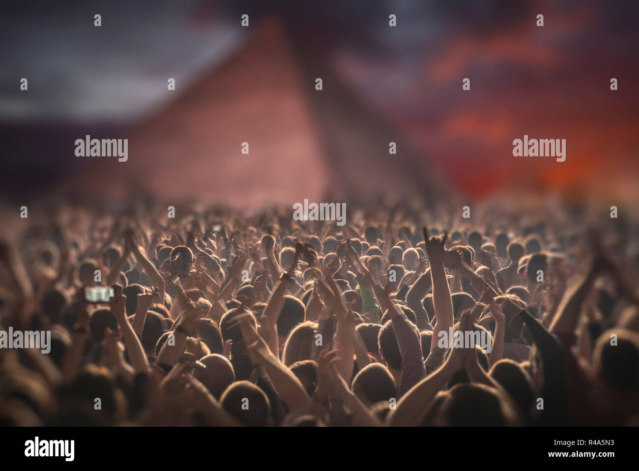 concert in the Pyramids of Egypt. A crowd of people celebrating a