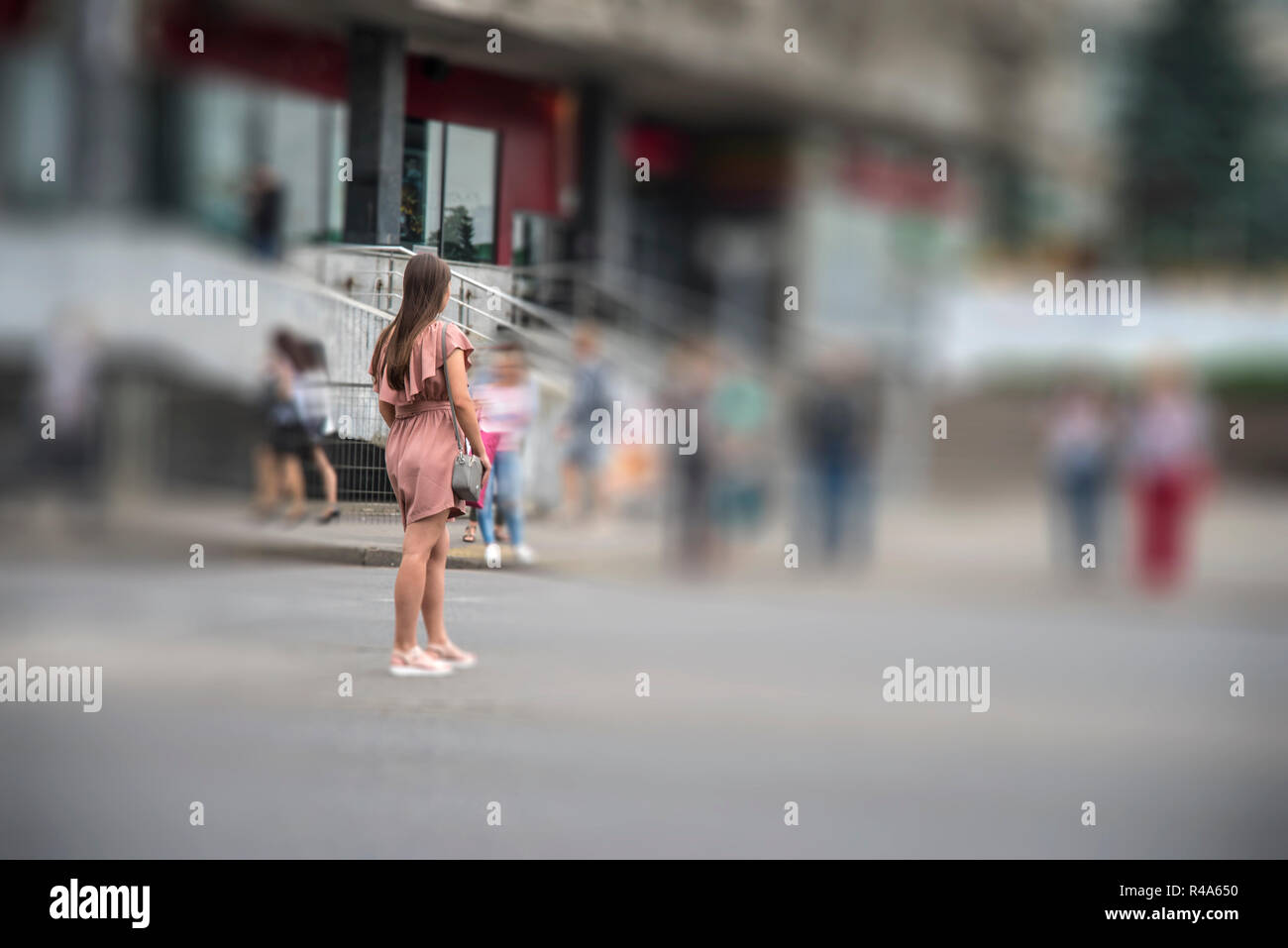 girl crosses the road at the pedestrian crossing Minsk Stock Photo