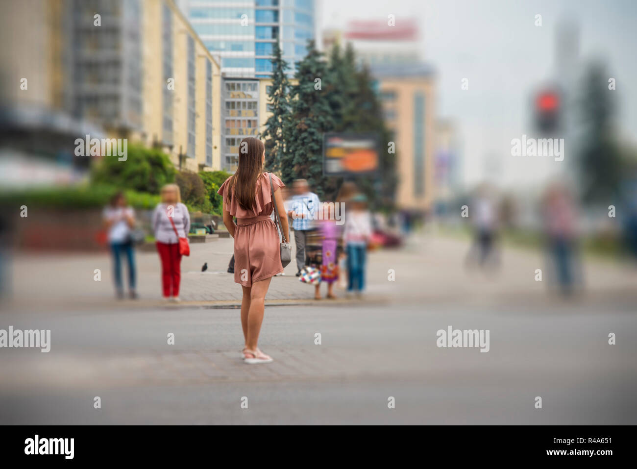 girl crosses the road at the pedestrian crossing Minsk Stock Photo