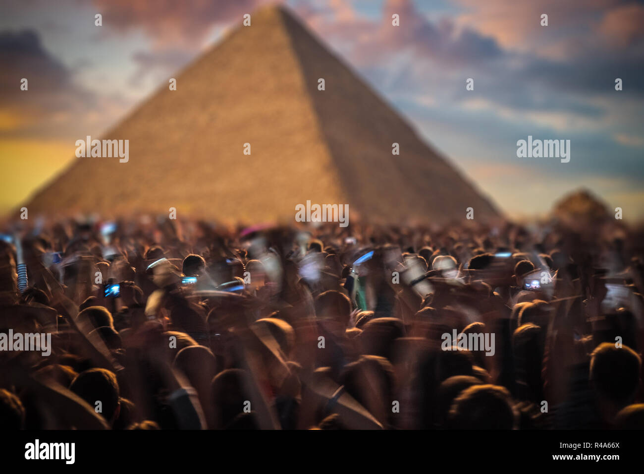 concert in the Pyramids of Egypt. A crowd of people celebrating a
