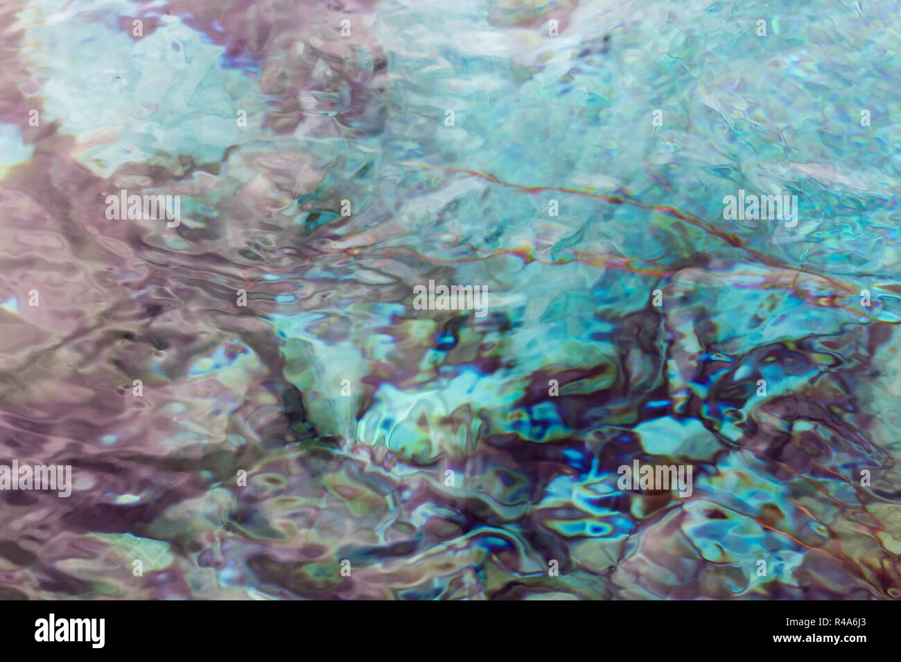 Abstract nature background image of the clear fresh water of Waikoropupu Springs, New Zealand. Stock Photo
