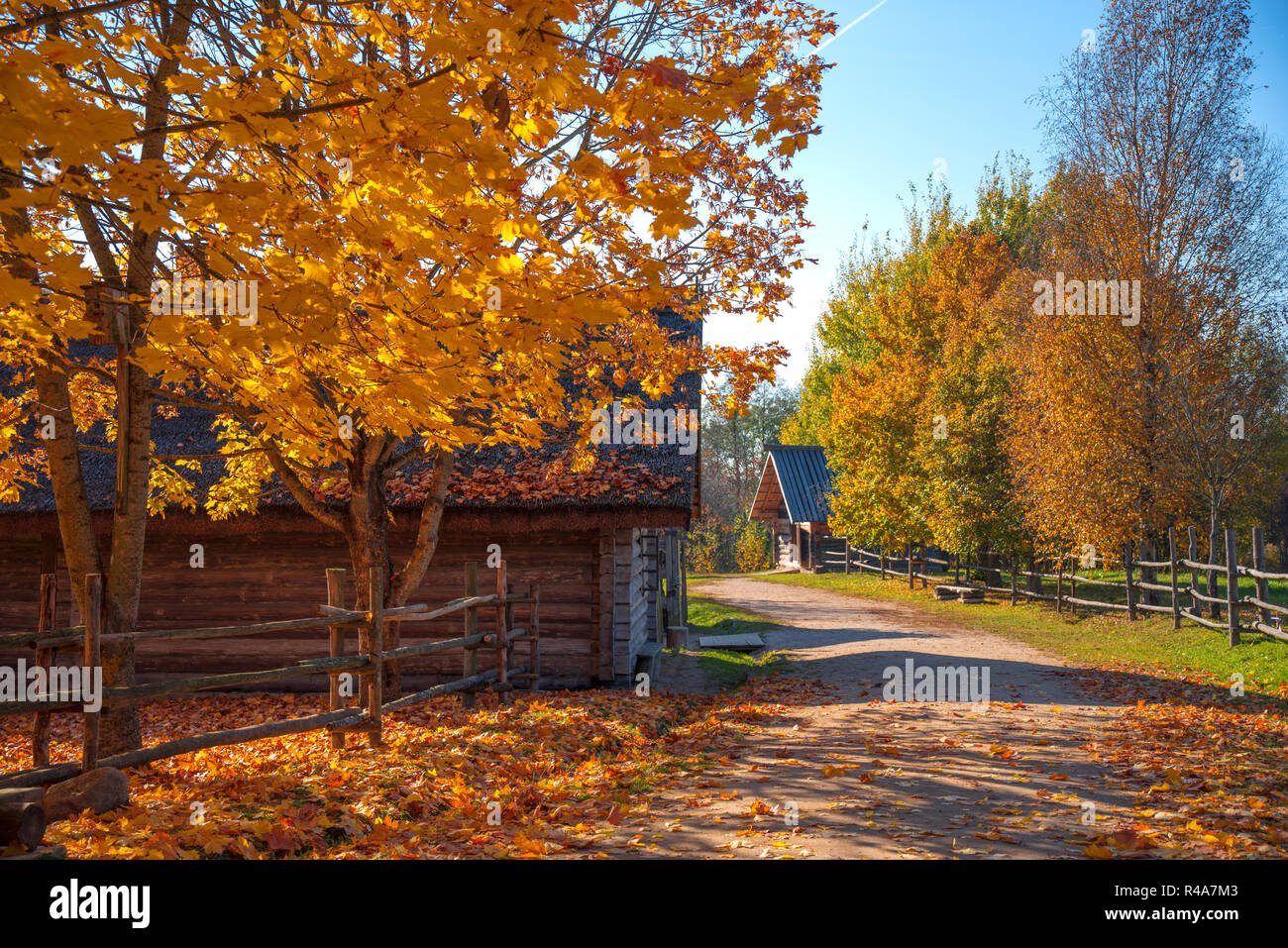 Russian old village in autumn. Wooden houses Stock Photo - Alamy