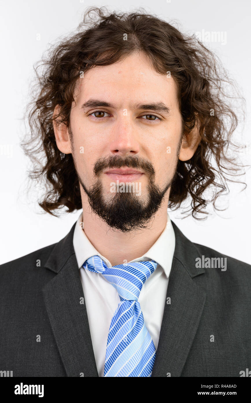 Face of young handsome Caucasian businessman looking at camera Stock ...